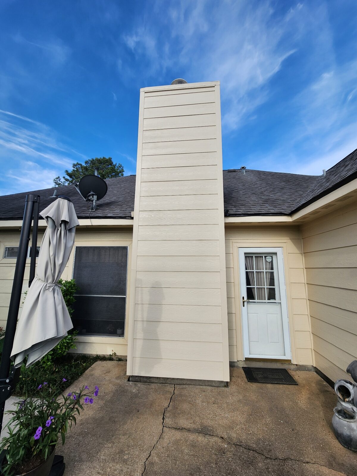 Exterior repaint of siding, trim, and door surround